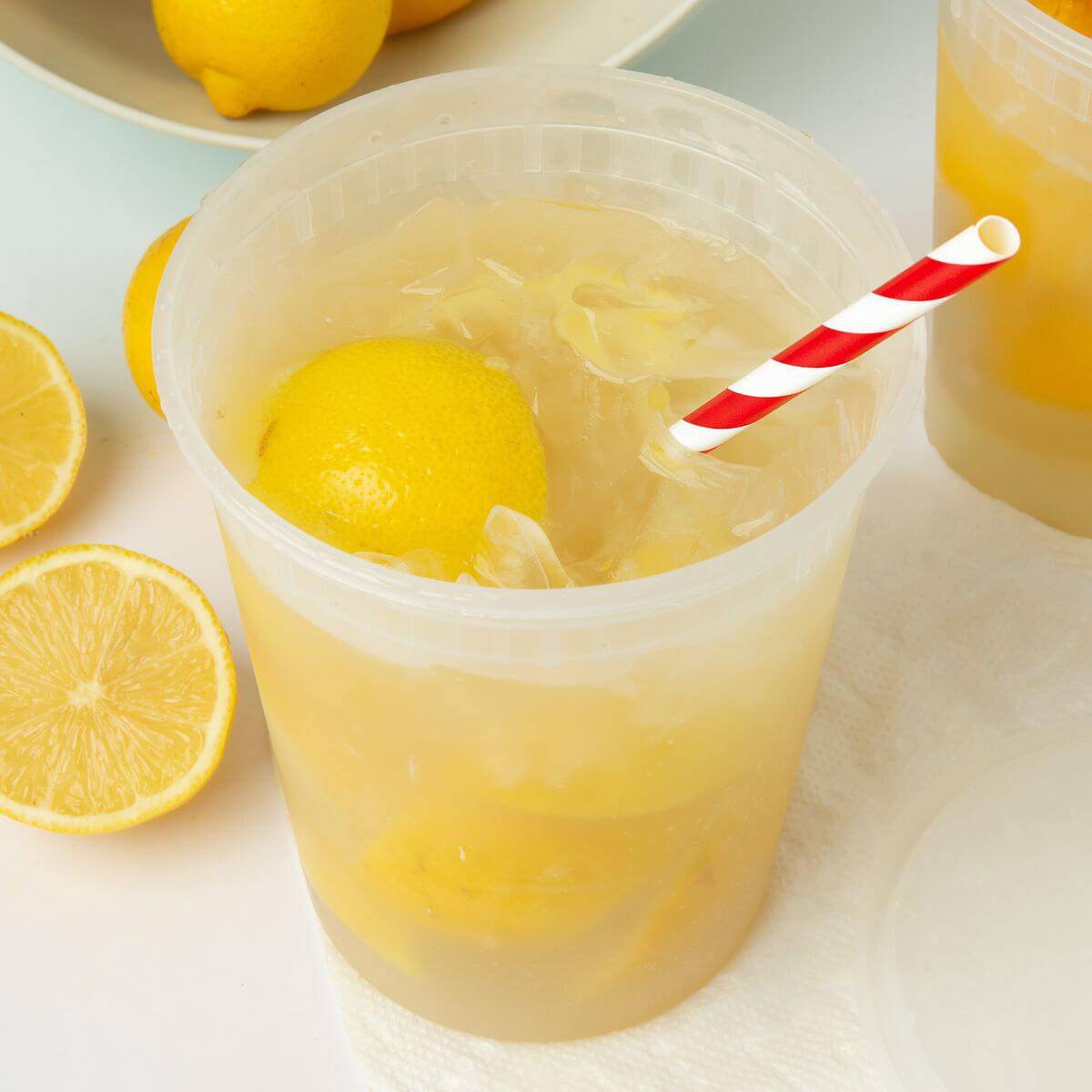 state fair lemonade in plastic container with straw