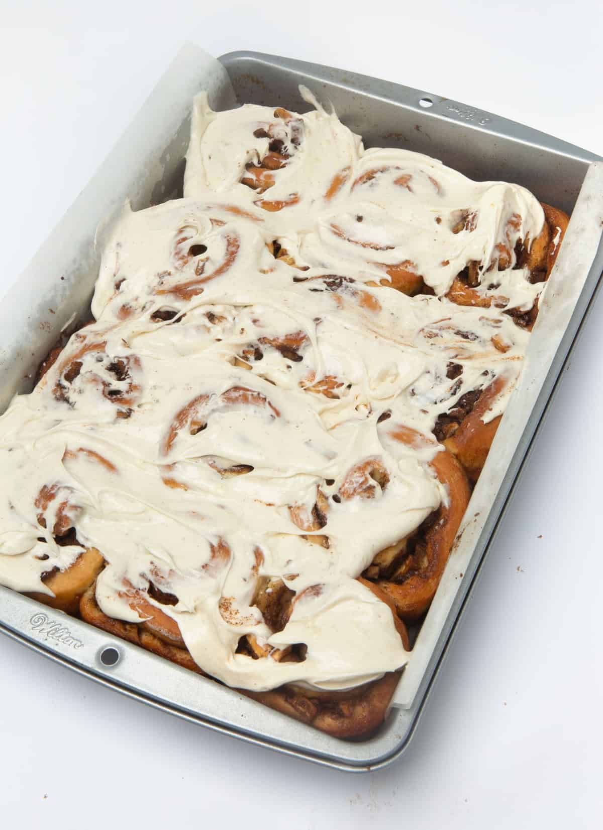 frosted pan of apple cinnamon rolls