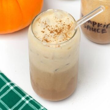 pumpkin cream cold brew in glass with straw