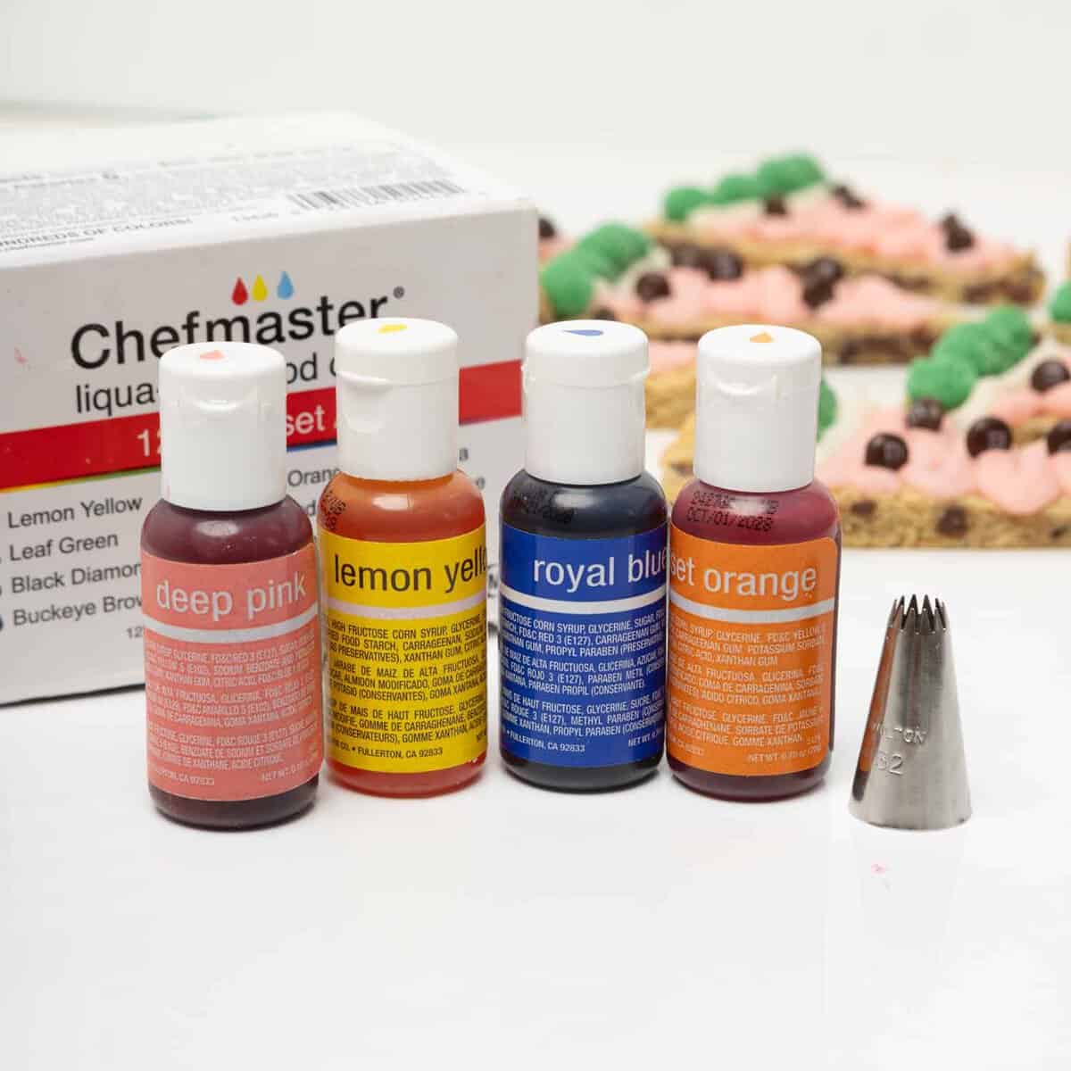 Chefmaster gel food coloring bottles including Deep Pink, Yellow, Orange, Royal Blue, and other colors