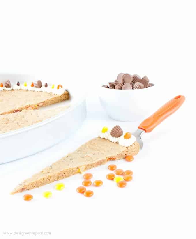Forget the store bought! This Reeses Peanut Butter Cookie Cake by @designeatrepeat is easy to whip up and just as tasty as its premade competition! Yum!jpg