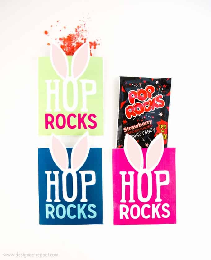 Need a fun way to spruce up your kid's Easter basket? Print off these Free Easter Printable "Hop Rock" Pouches and add in a packet of pop rocks for a fun surprise!