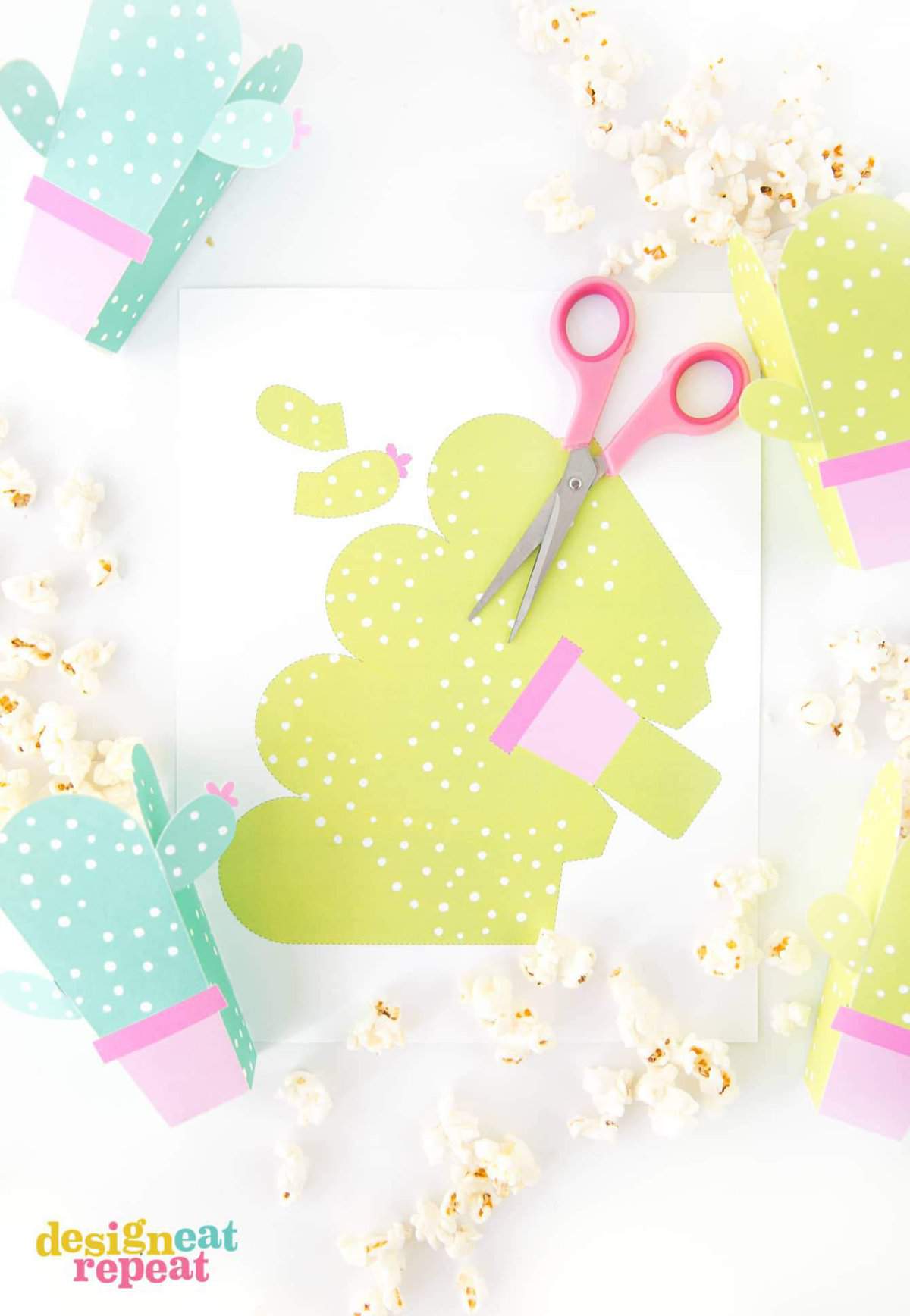 Can these be any cuter?! Cactus popcorn boxes! Get the free popcorn box template at DesignEatRepeat.com | #printable #popcornbox