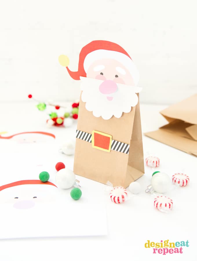 Looking for a new way to gift all those homemade candies and cookies this Christmas? These Free Printable Santa Treat Bags will surely do the trick!