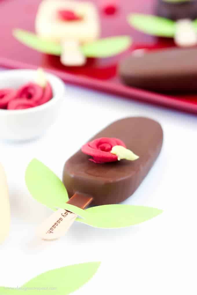 Switch up your Valentine's Day dessert with these fun ice cream bar roses! So fun and simple to make with this tutorial from Design Eat Repeat! Makes for a unique Valentine's Day treat idea!