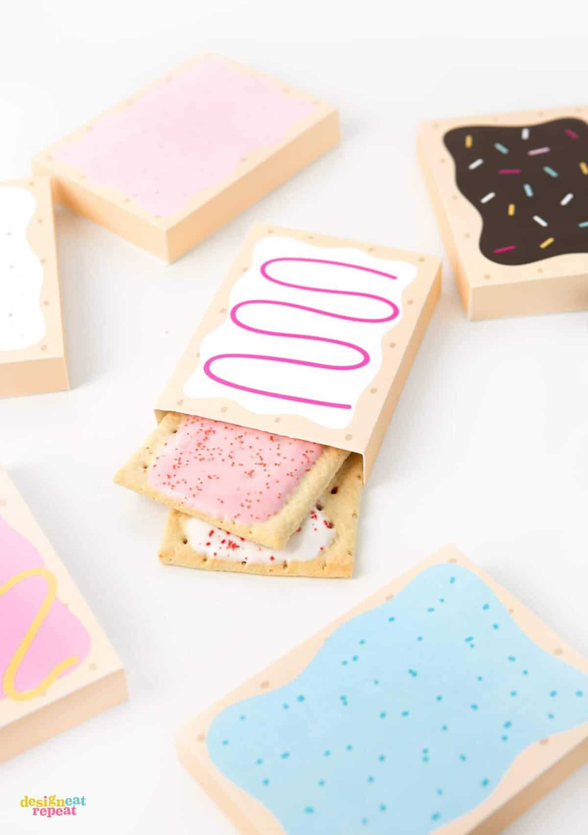 How fun are these?! Printable POP-TART treat boxes! With 8 delectable designs, these gift box templates are sure to please your party goers with their flavor of choice! Download at DesignEatRepeat.com | #printable #silhouette