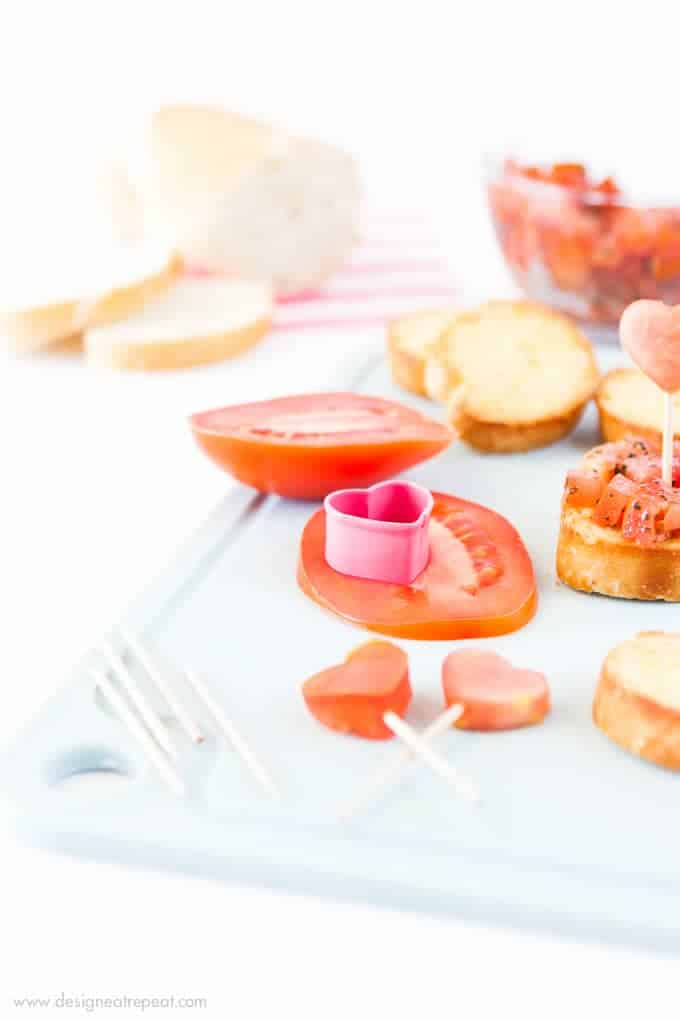 Use a mini heart cookie cutter to turn ordinary bruschetta into a festive Valentine's appetizer!