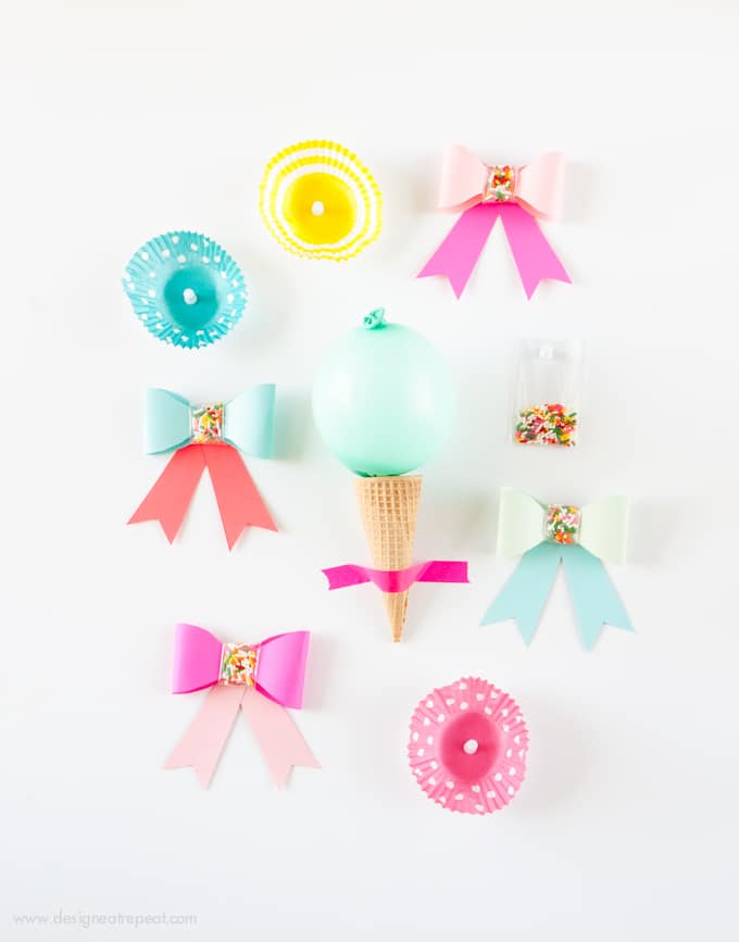 Use this free printable template to make these adorable DIY Paper SPRINKLE bows! Great for birthdays, holidays, or just to gift fun supplies to your favorite baker! Easy & fun!