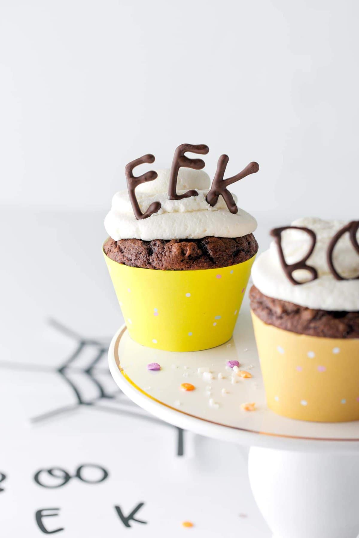 Chocolate cupcake with EEK edible Halloween cupcake topper.