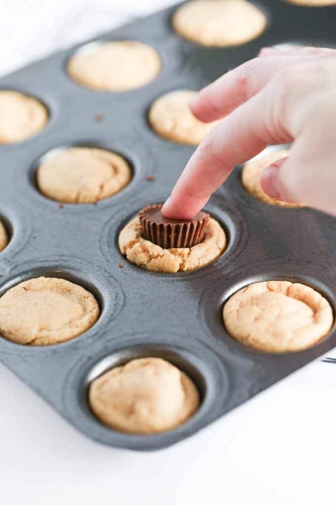 Press Reeses Peanut Butter Cups in Valentines Cookie Cups