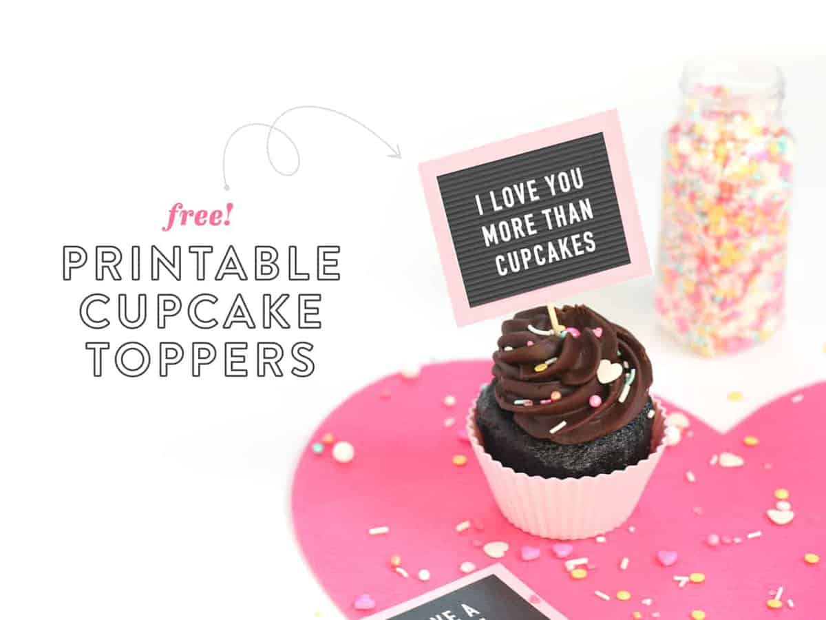 Chocolate cupcakes with Free Printable Valentine Cupcake Toppers - mini pink letterboards! Have a Sweet Valentine's Day and I Love You More Than Cupcakes Phrases