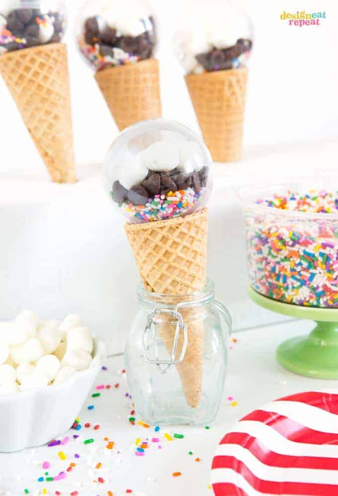 Fill plastic balls with your favorite toppings for a fun way to allow guest's to personalize their bowl of ice cream! Perfect ice cream party favors!