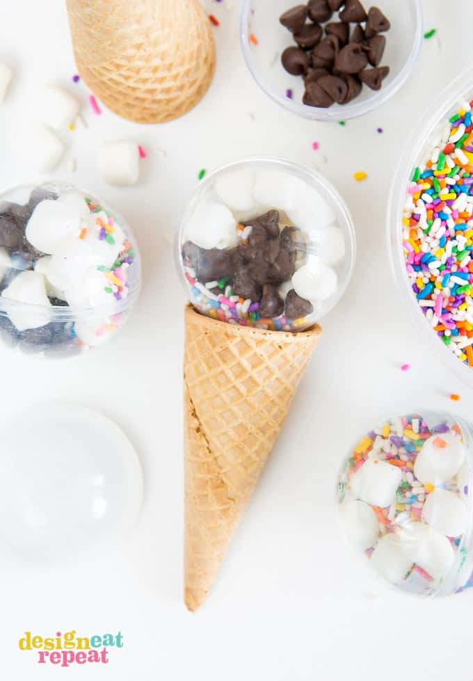 Fill plastic balls with your favorite toppings for a fun way to allow guest's to personalize their bowl of ice cream! Perfect ice cream party favors!