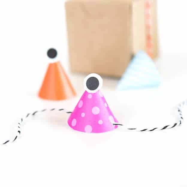 Freebie! Attach these printable monster party hats to treat boxes for fun Halloween party favors!