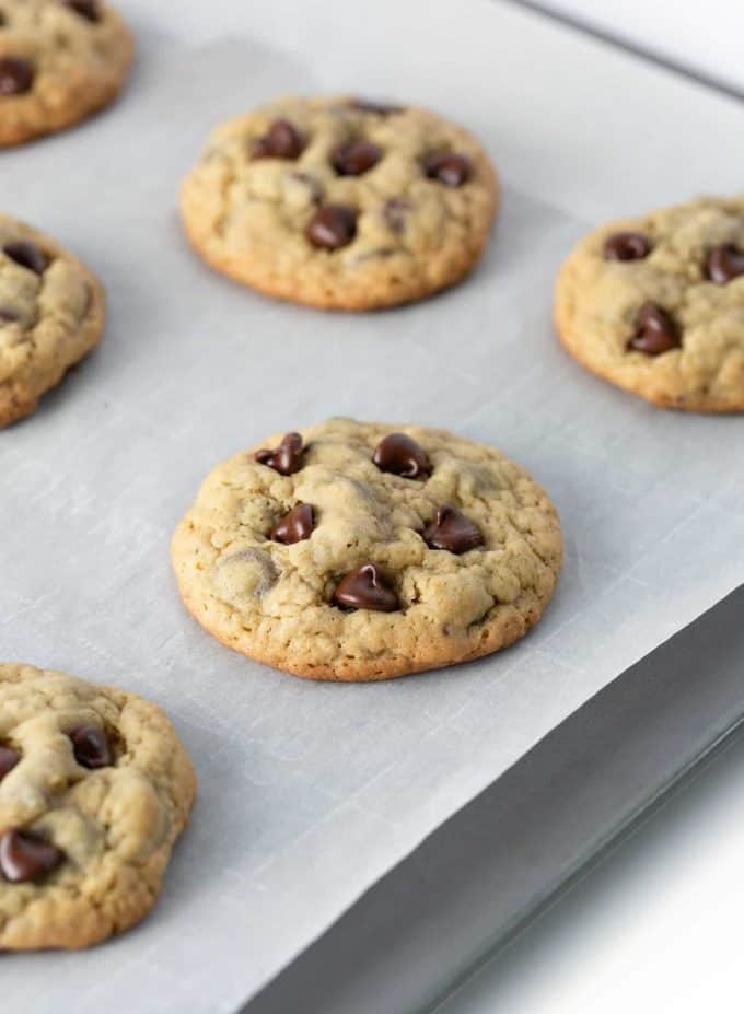 Baking pan of chewy oatmeal chocolate chip cookies