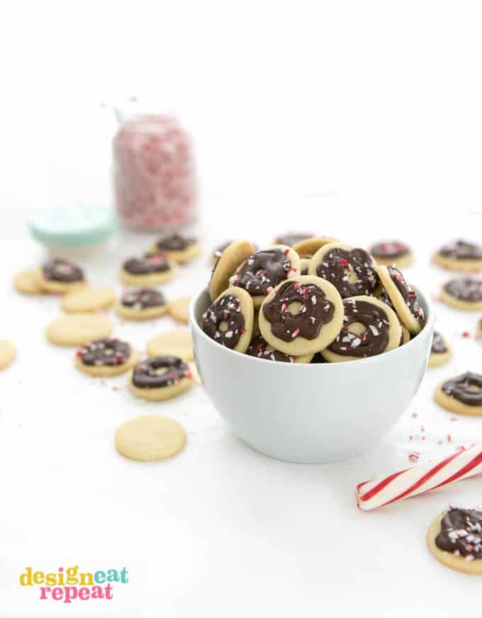 Bowl of peppermint cookie wafers that are decorated like donuts.