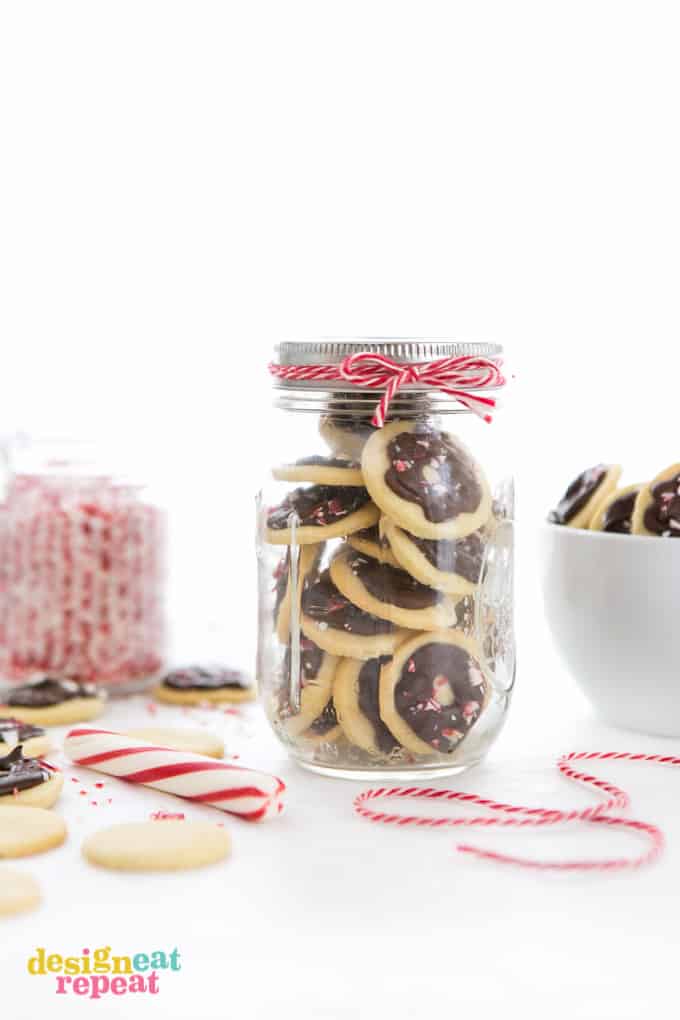 Jar of peppermint cookie wafers with red twine wrapped around the lid.