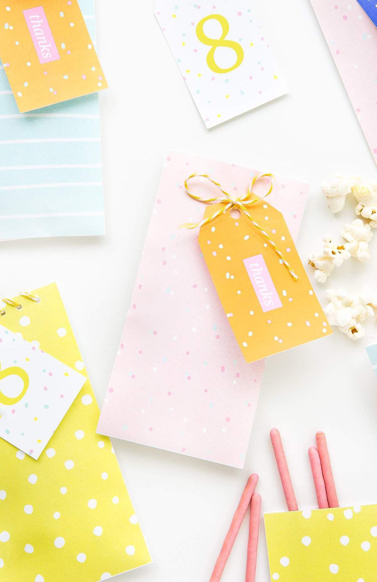 Download these fun & colorful printable birthday gift tags and attach them to treat bags for an easy party favor idea!
