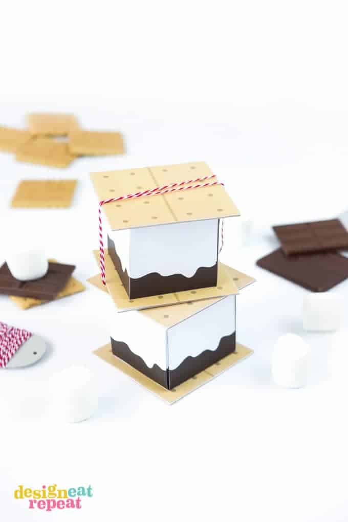 Dive into summer with these FREE S'more Printable Treat Boxes! Perfect for a camping-themed birthday parties, summer barbecues, or just as fun way to spruce up a night of indoor microwave s'mores!